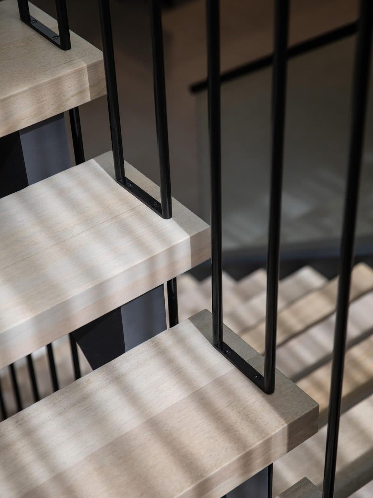 Black steel baluster and tread junction — Bar Beach Avenue