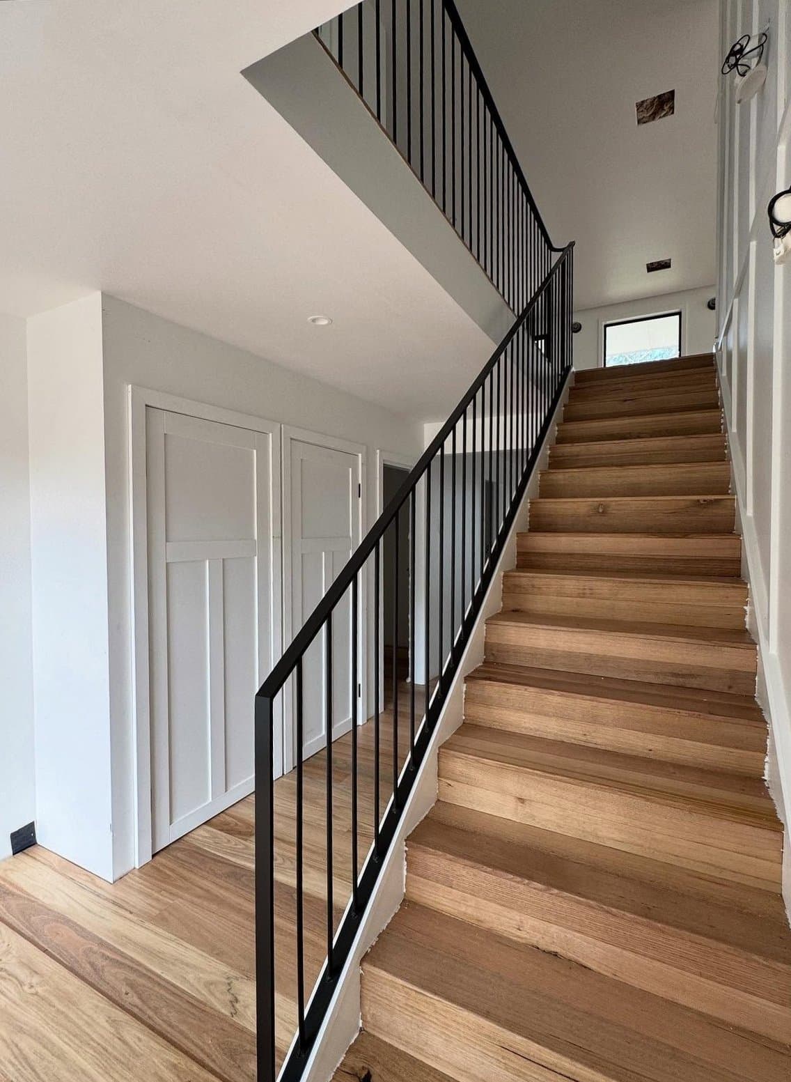 The stair run down to the lower level